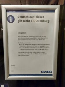 Sign in German stating that Deutschland-Ticket is not valid to Strasbourg. Schild in deutscher Sprache mit dem Hinweis, dass das Deutschland-Ticket nicht bis Straßburg gültig ist. Panneau en allemand indiquant que le Deutschland-Ticket n'est pas valable jusqu'à Strasbourg. 