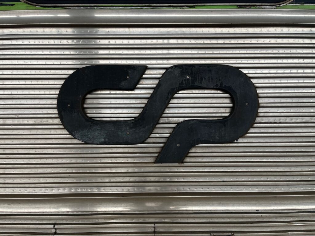 CP Logo on a stainless steel carriage