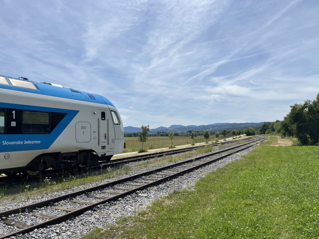 A blue and white train with 